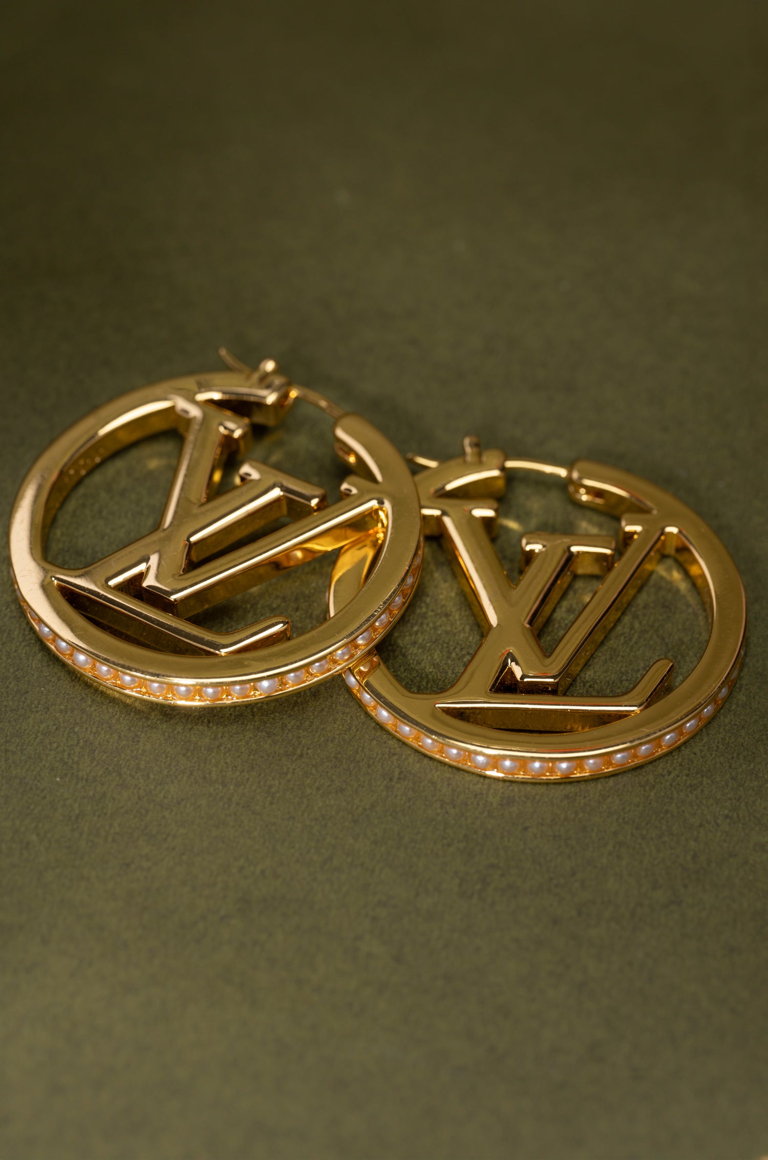 Gleaming Golden Mark Elvy Studs