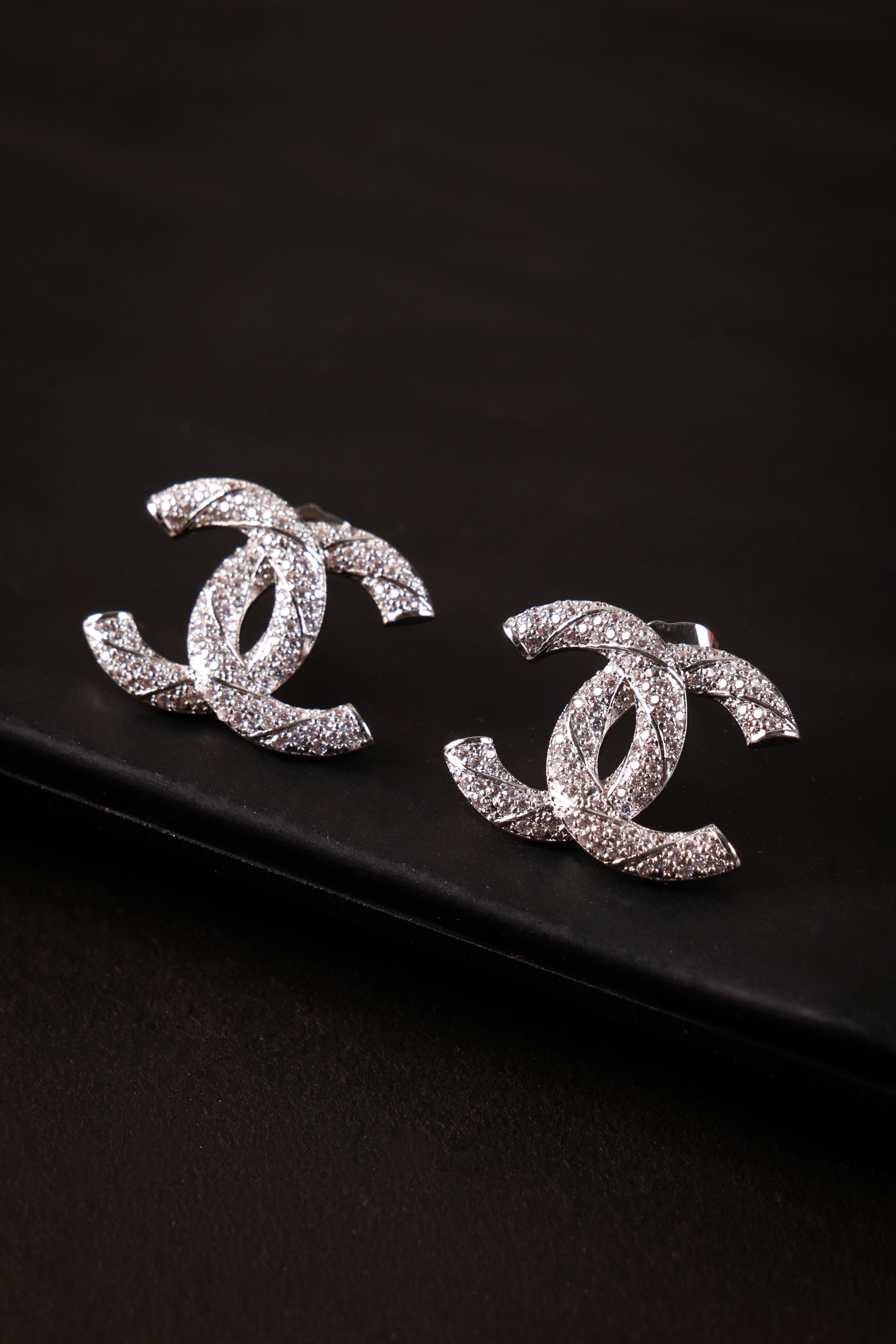 Ornate Silver Shanel Studs