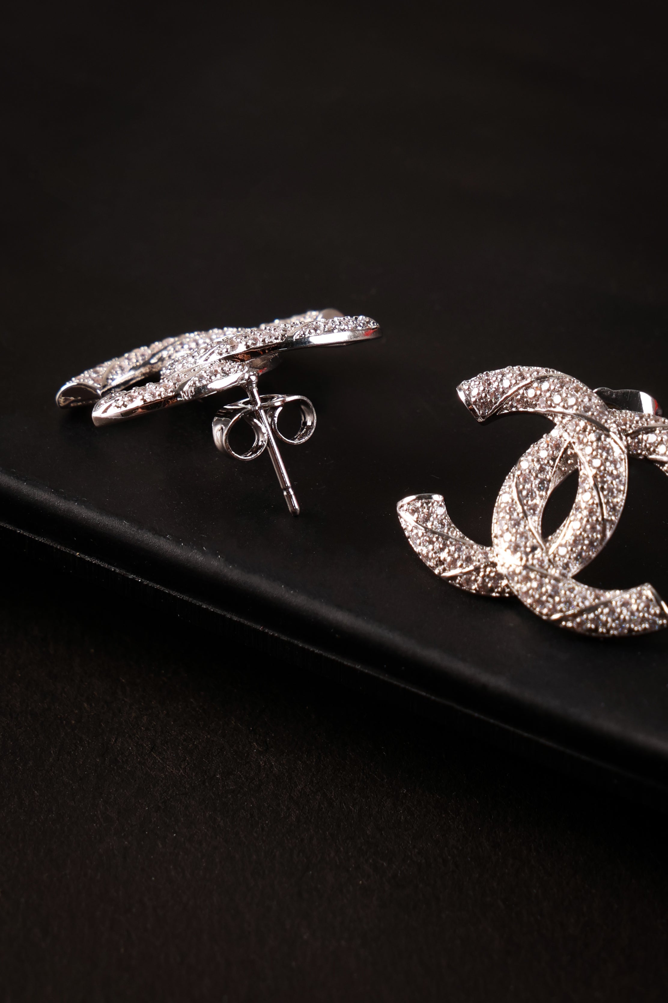 Ornate Silver Shanel Studs