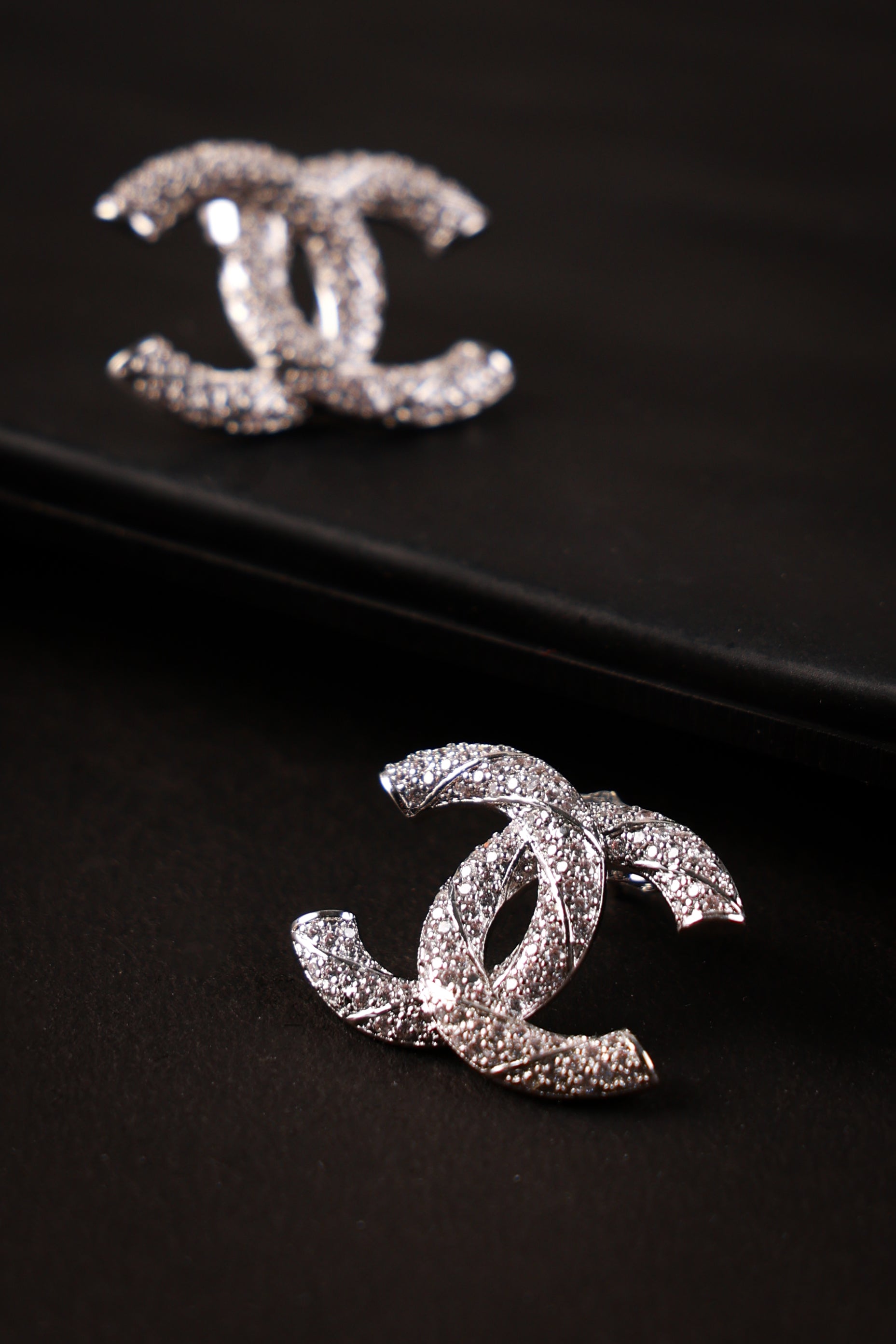 Ornate Silver Shanel Studs