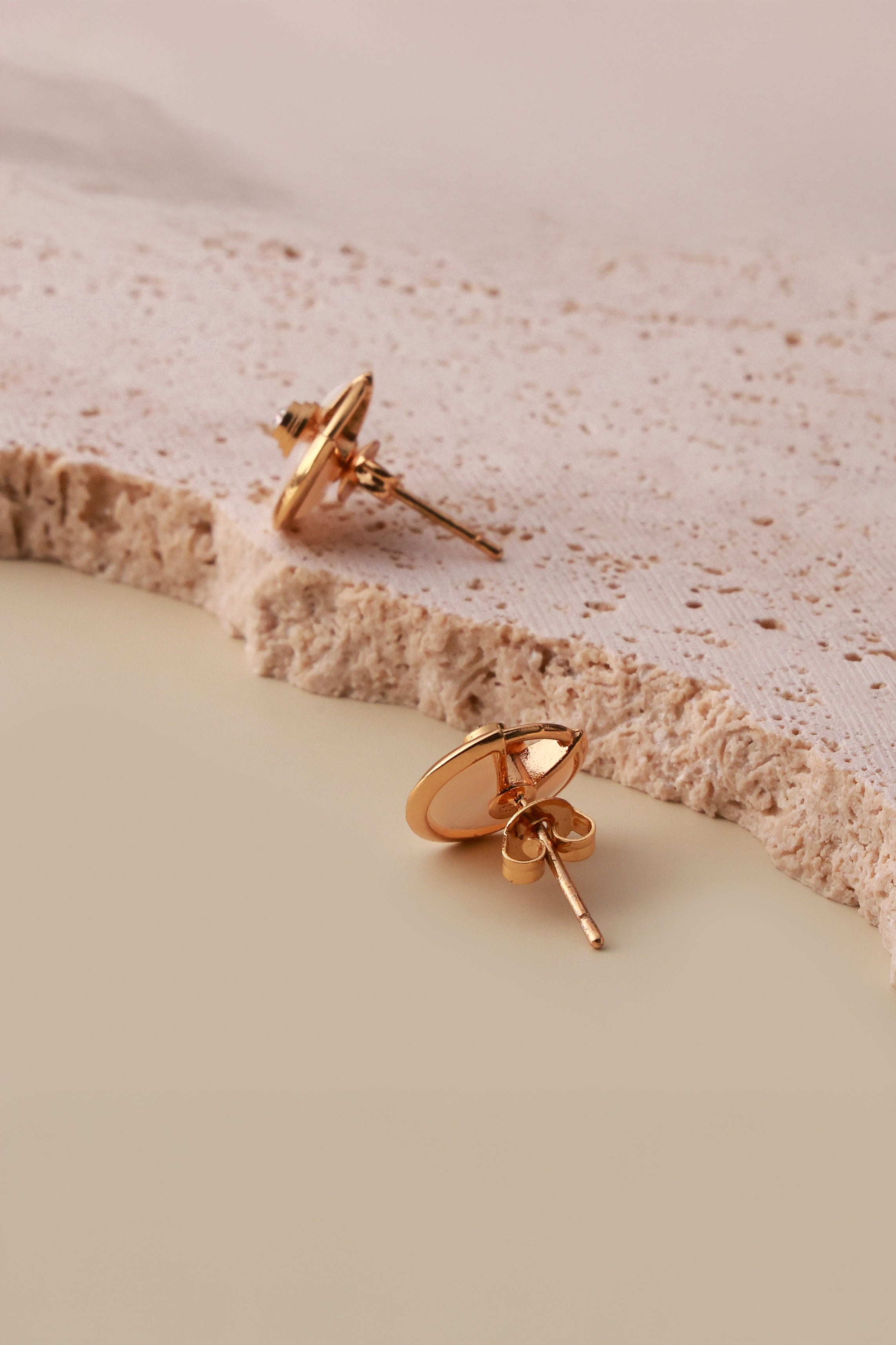 White Quarter Celone Studs